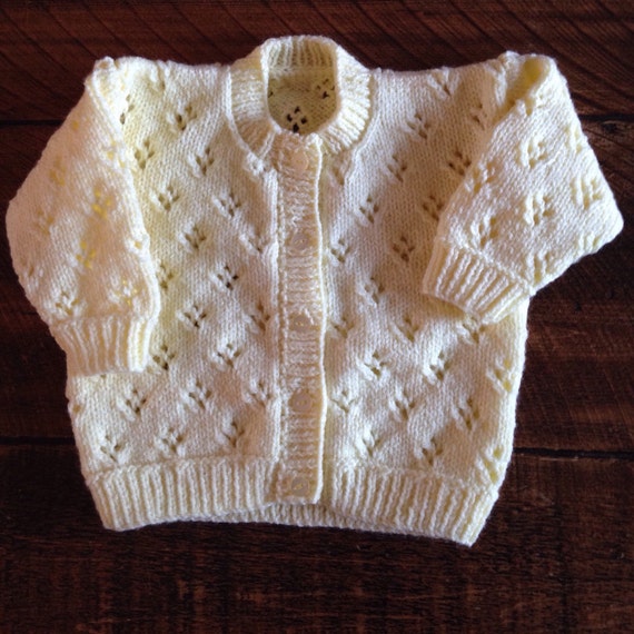 Pretty hand knitted baby cardigan available in choice of
