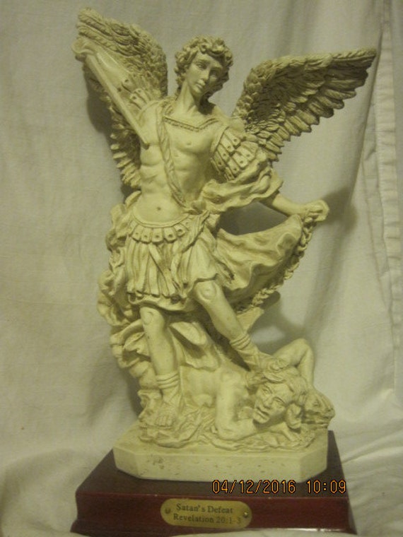 Satan's Defeat statue Bible Angel Armageddon Revelation 20