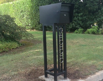 Mid century steel mailbox stand with locking mailbox