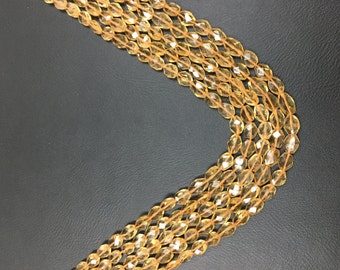 Citrine Faceted Oval, 5x7mm to 6x9mm size, 14 Inch Strand, Quality AA, Yellow Citrine Faceted Oval Beads