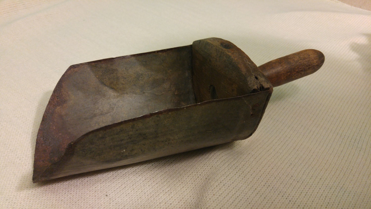 Antique hand scoop metal and wood scoop