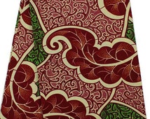 Vibrant Seed Pod Fabric – Red and Green Floral Motif on Black Ankara Wax Print