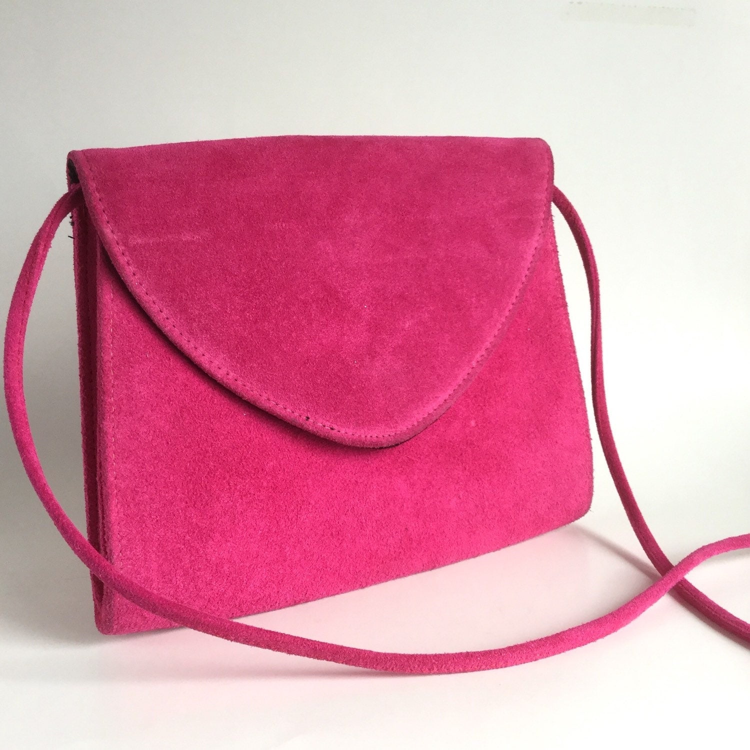 hot pink suede bag