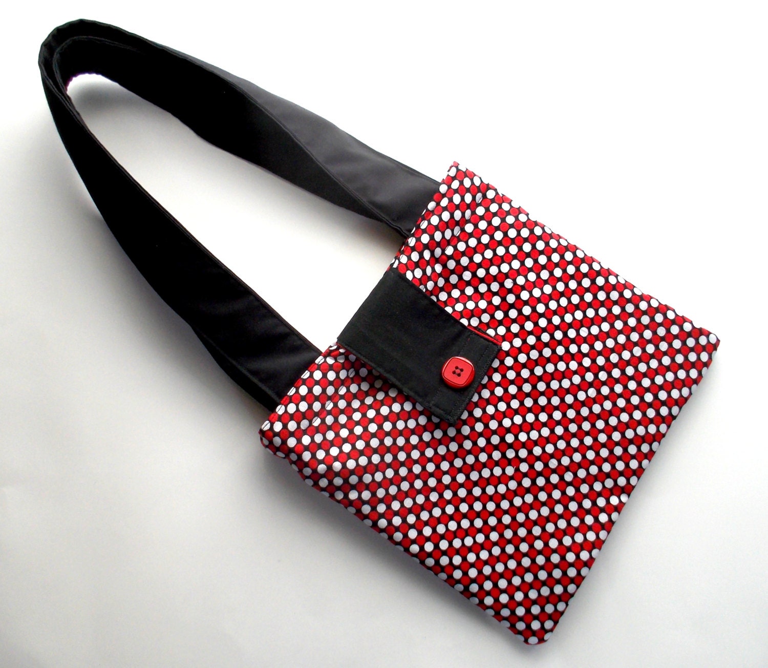 red polka dot purse