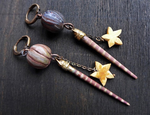 Clay Underfoot. Rustic artisan earrings with polymer clay art beadsin soft mauve.  