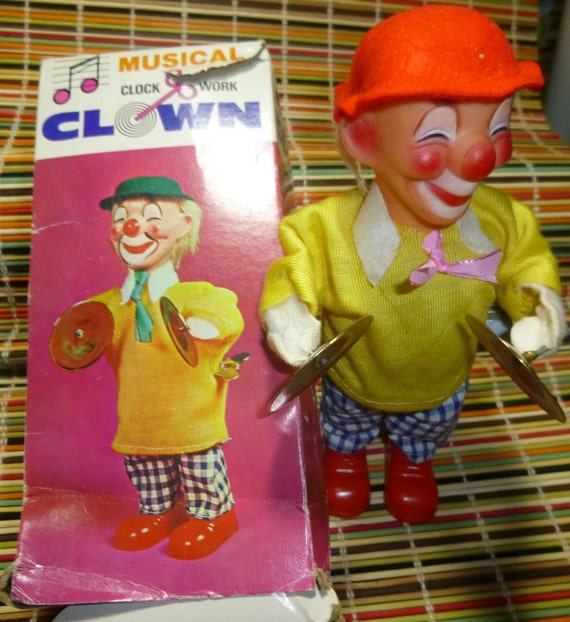 vintage wind up musical clown
