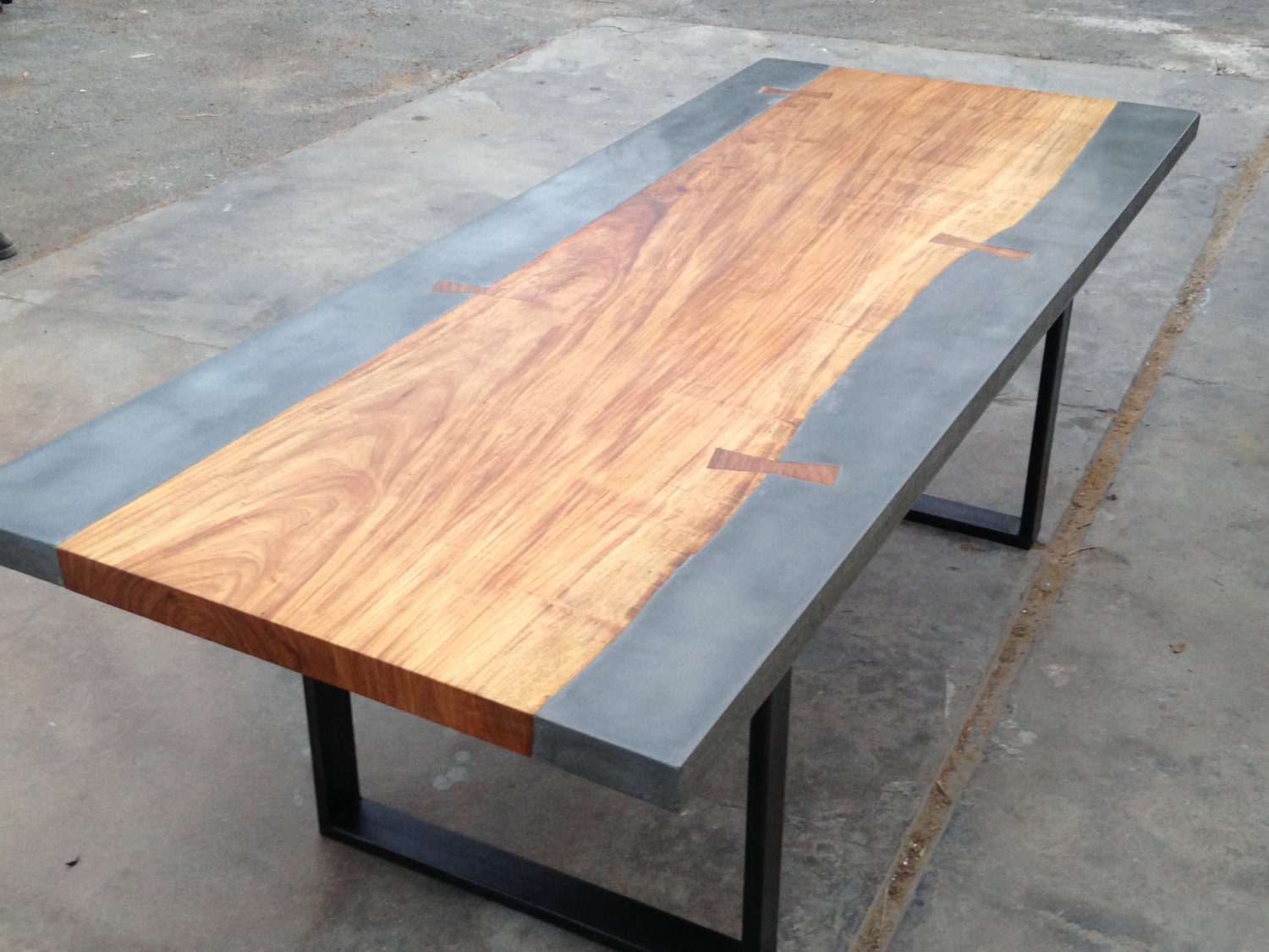 Modern industrial wood and concrete dining table