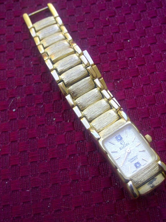 Ladies Elgin Gold diamond quartz watch...FREE shipping