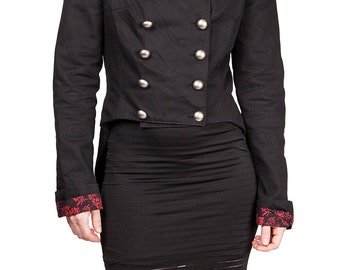 Veste à queue de pie, courte devant, double boutonnage, doublure fantaisie, manches longues, col montant