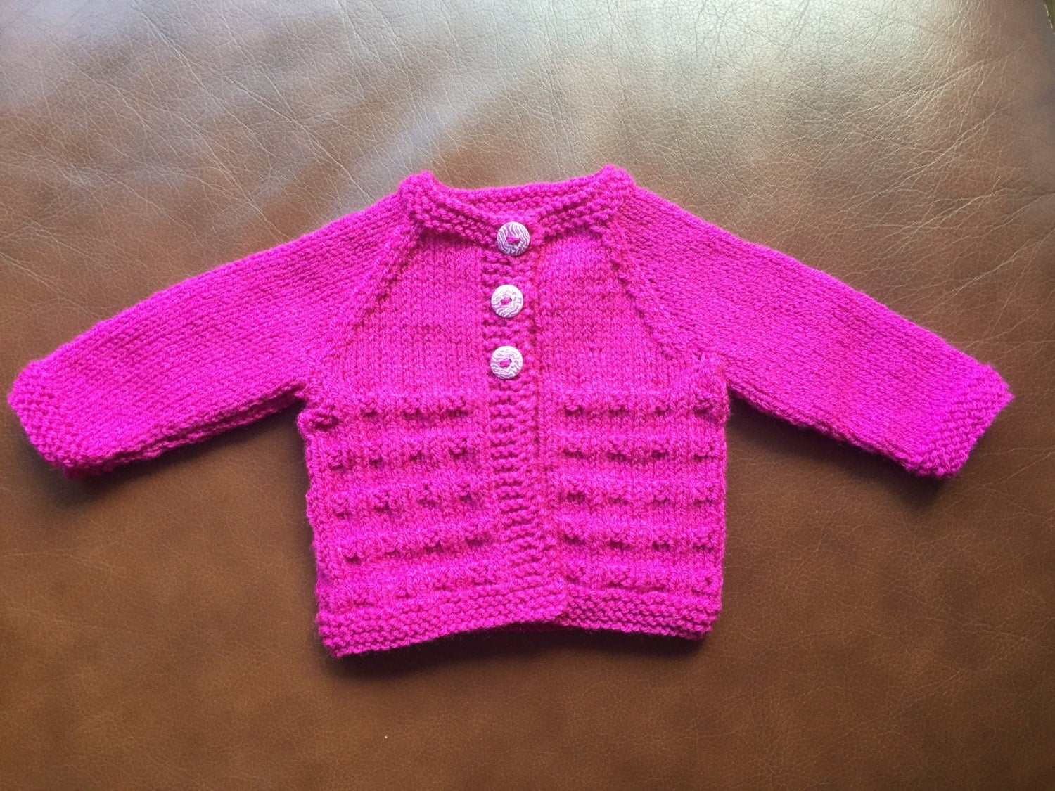 Hand knitted baby cardigan super soft acrylic yarn cerise