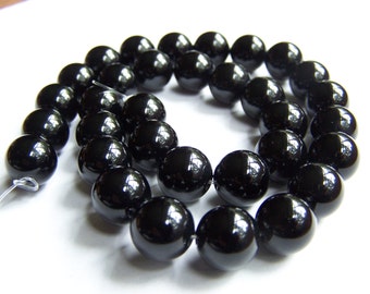 Black Onyx Smooth round 12mm beads 15.5 inch strand