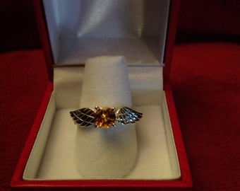Beautiful sterling silver ring inspired by the Golden Snitch.