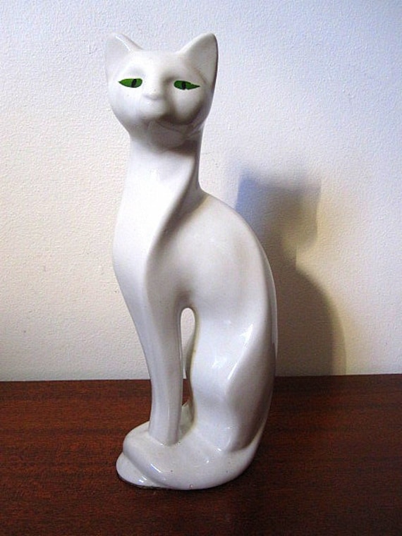 white ceramic cat figurine