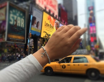 The Wanderlust Travel Bracelet in Silver.