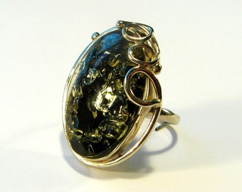 Natural Baltic green amber ring.