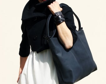 anthracite leather bag with handles and shoulder strap