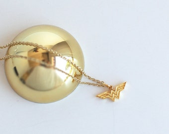 Tiny Wonder Woman necklace made with sterling 925 silver and 18k gold