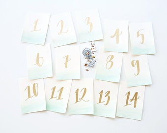 calligraphy mint watercolor and gold table numbers // handwritten wedding decor in calligraphy font // handwriting with teal ombré