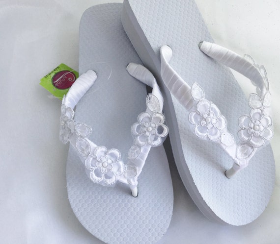 white lace flip flops