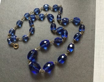 Deco COBALT GLASs BEAD NECKLACE Blue Glass Faceted Beads .5" to 1" Oval Cut Crystal Graduated Beads 1920's 25 inches