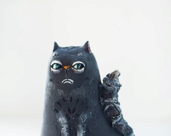 black cat ceramic statue