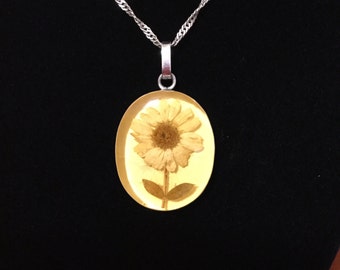 Beautiful Silver necklace with a real flower pendant