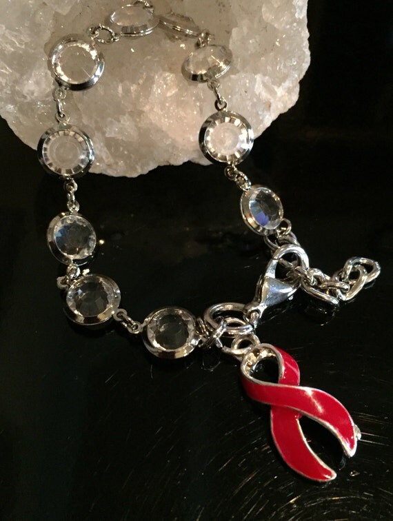 Red Ribbon Bracelet / Crystals / by RockYourCauseJewelry on Etsy