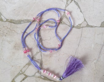 Beaded necklace with tassel