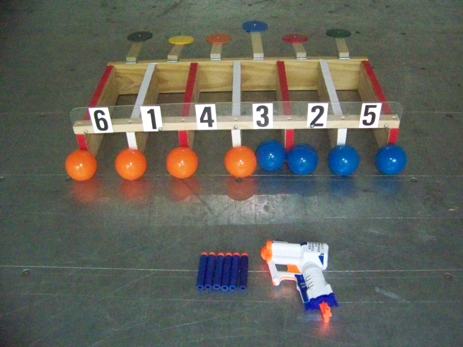 Shooting gallery carnival game tailgating ball roll lawn