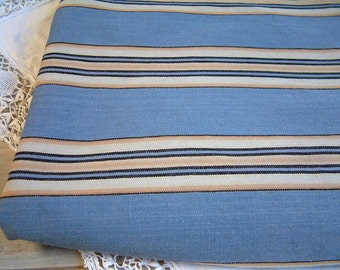 French vintage mattress ticking in blue, gold, beige stripes. Blue stripe mattress ticking fabric. Vintage mattress fabric DIY projects.