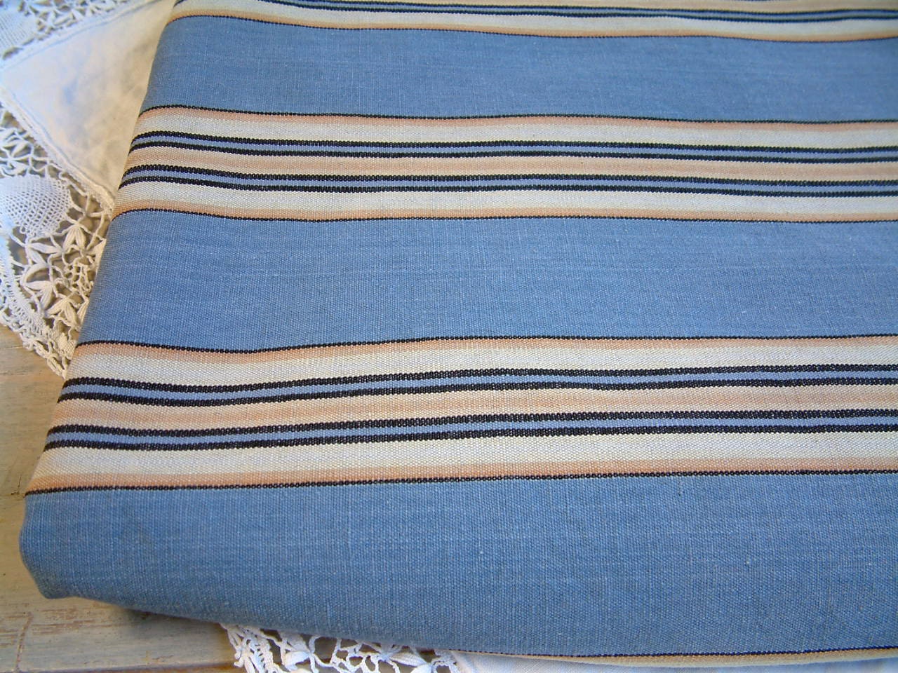 French vintage mattress ticking in blue gold beige stripes.