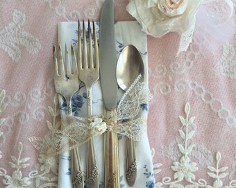 Silverplated vintage flatware with shabby chic napkin