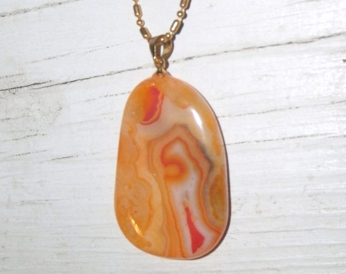 Freeform Lace Agate Necklace - lacey patterns, various shades of yellow orange and red with some white, gold plated Stainless Steel chain