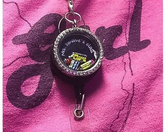 Lanyard chain for retractable badge floating locket reel slide clip