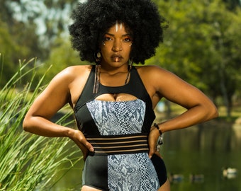 NEW Sexy Support in a One-piece swimsuit with inside bra & adjustable straps for bust support. Our Girdle Mesh lining for tummy control.