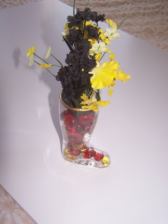 German Boot FLORAL ARRANGEMENT Yellow and Black flowers in a