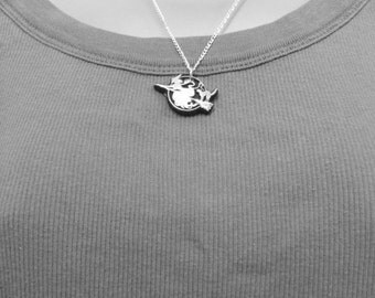witch on broomstick pendant