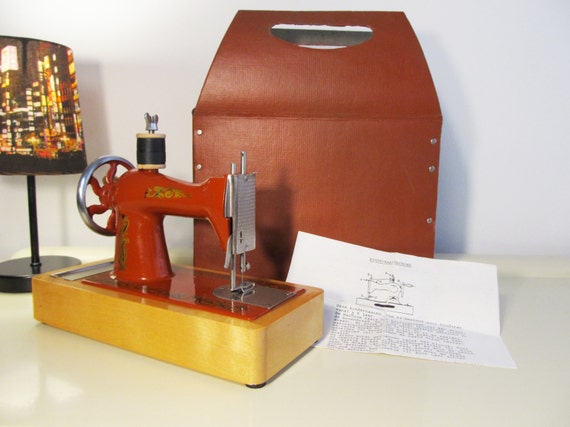 Vintage Toy Sewing Hand Crank Machine with Wood Base by LaLanterne