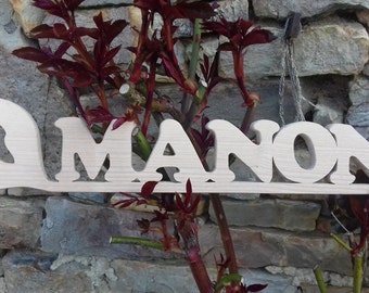 First name in solid wood with animal offered