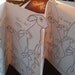 RESERVED For Over 65s Its That Time Again Happy Birthday Handmade Card in White with lots and lots and lots of Grey Hares + Pink Hare Card