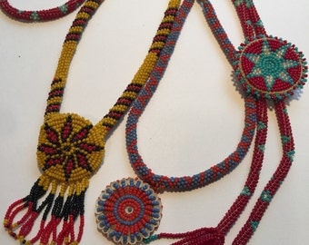 Items similar to Native American Seed Bead Pendant - Moccasins