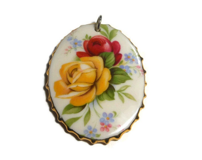 FREE SHIPPING Hand painted floral pendant, yellow and red roses on ceramic oval framed in gold painted scallops, signed Mela or Meta