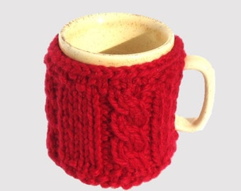 Mug cosy / cup cover hand-knitted in bright red pure wool. Mug cozy