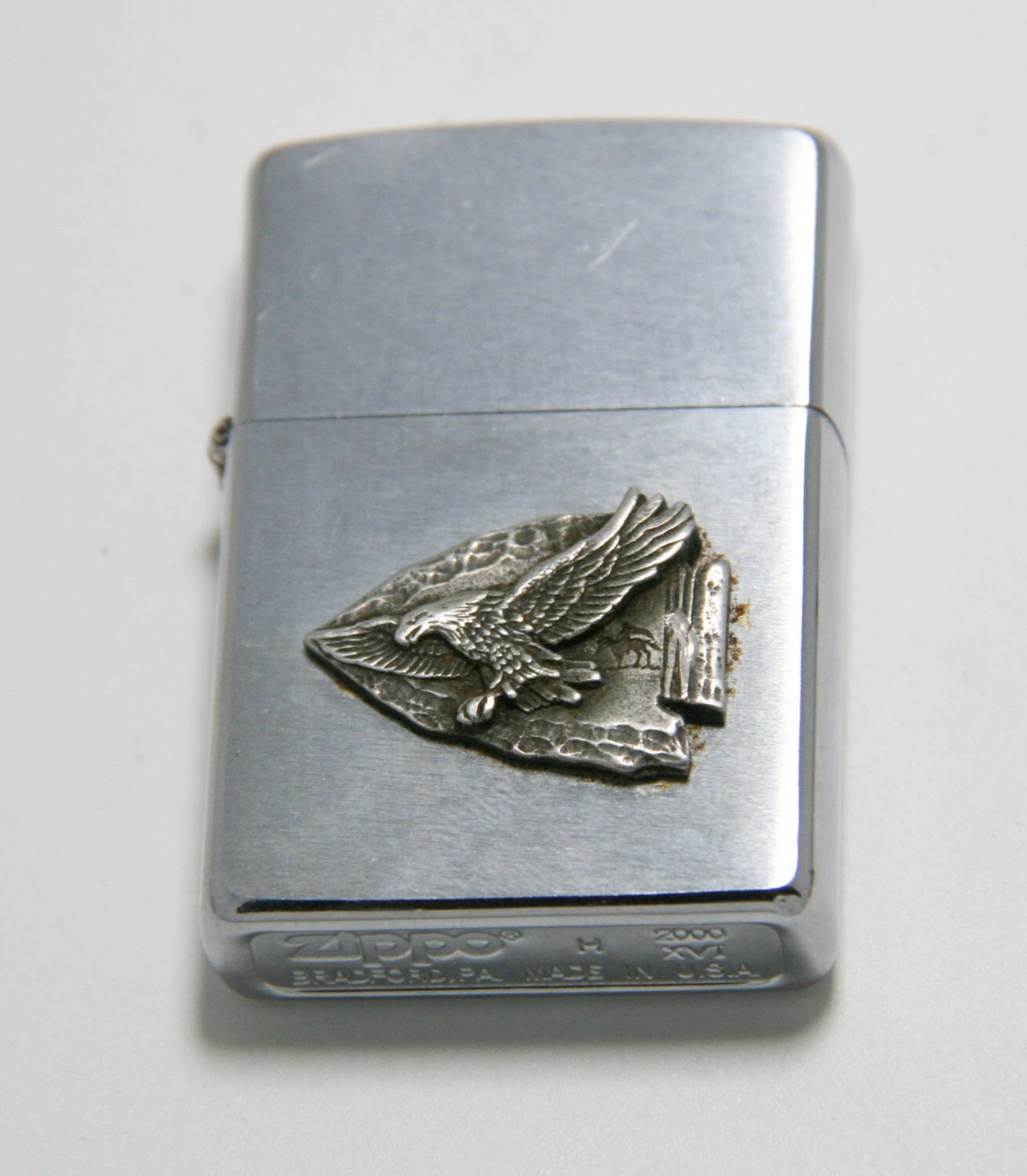 Zippo windproof lighter with vintage Native American arrowhead