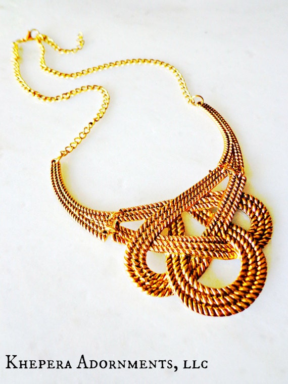 Gold Love Knot Necklace Statement Necklace by KheperaAdornments