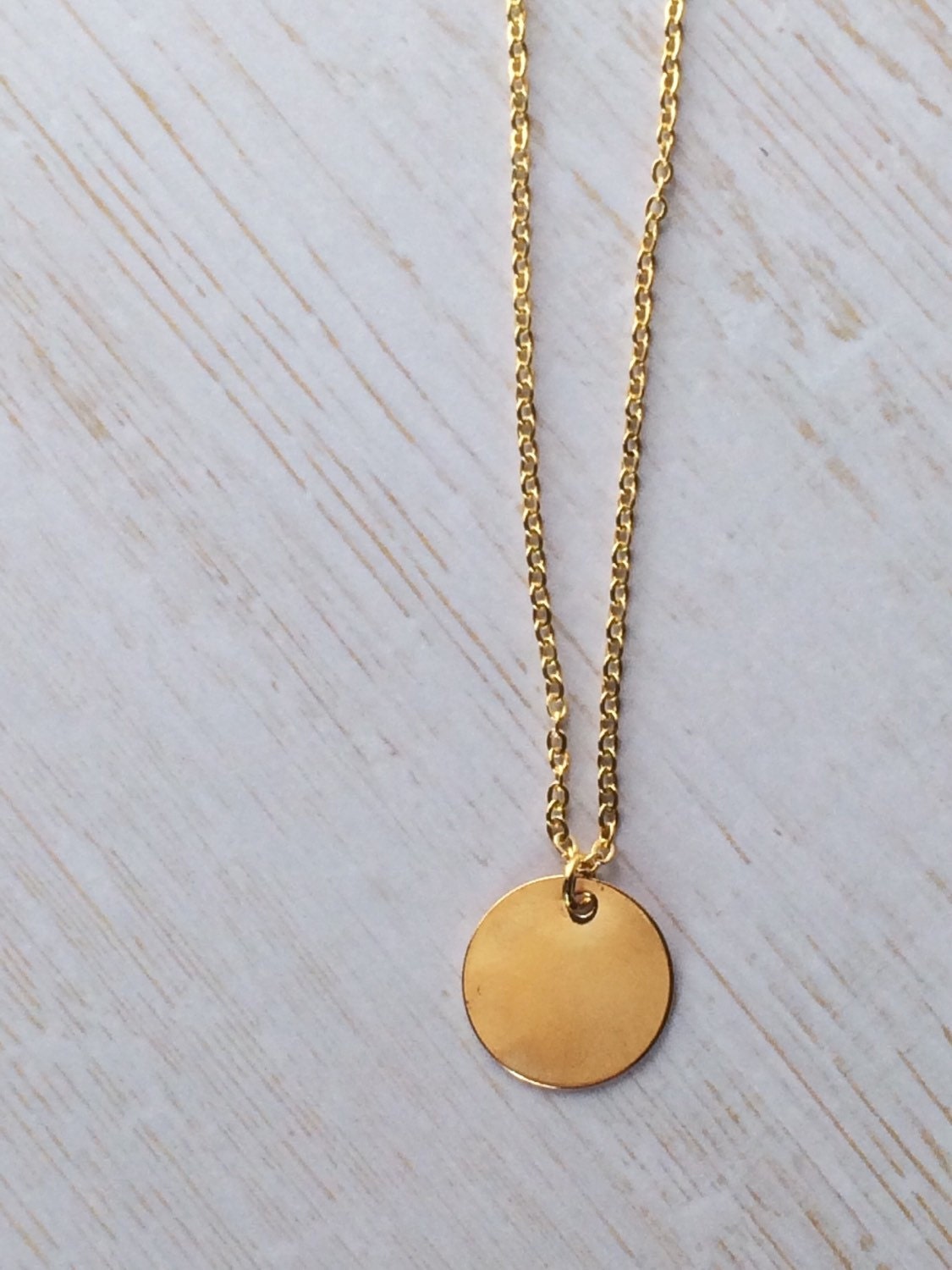 Gold circle pendant small on delicate gold chain