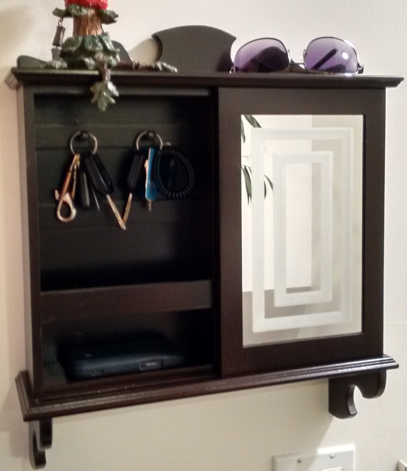 Wall organizer that has hooks for keys 6 shelves to store