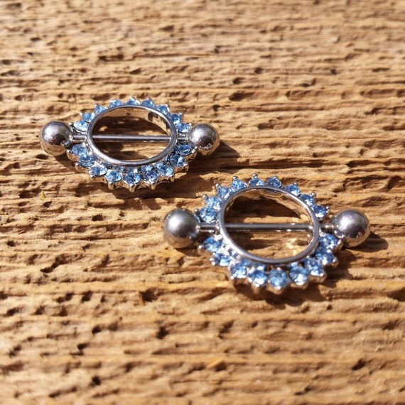 Nipple piercing. 16 gauge. Rhinestone shield. Body by EquitasMundi