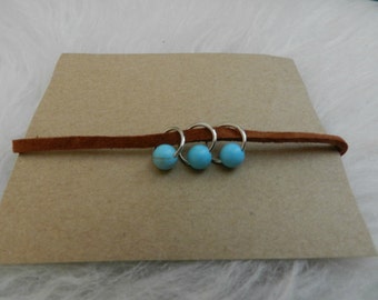 Brown suede bracelet with turquoise charms