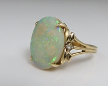 Popular items for opal diamond ring on Etsy